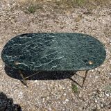 Oval coffee table in veined green marble