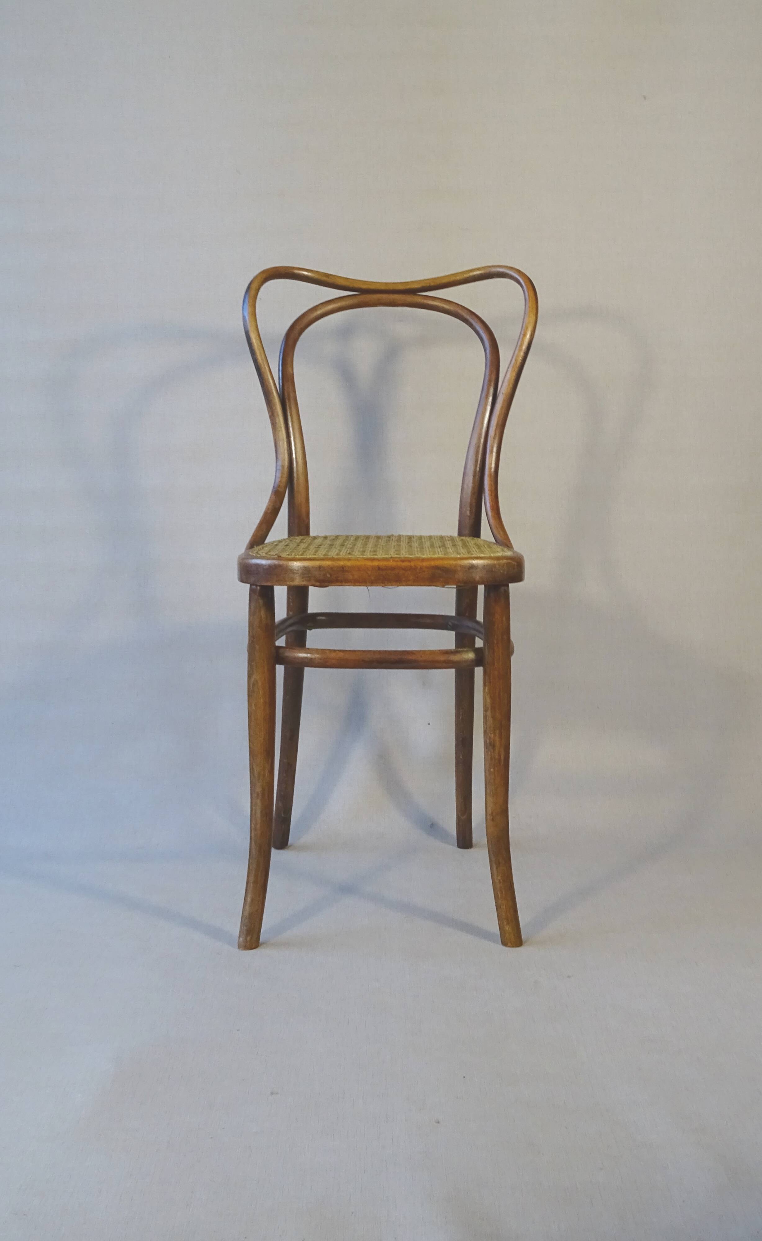 2 Bistro chairs No. 55- 3/4 by Kohn, circa 1905, caned