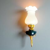 Brass wall sconce with frosted glass tulip lampshade