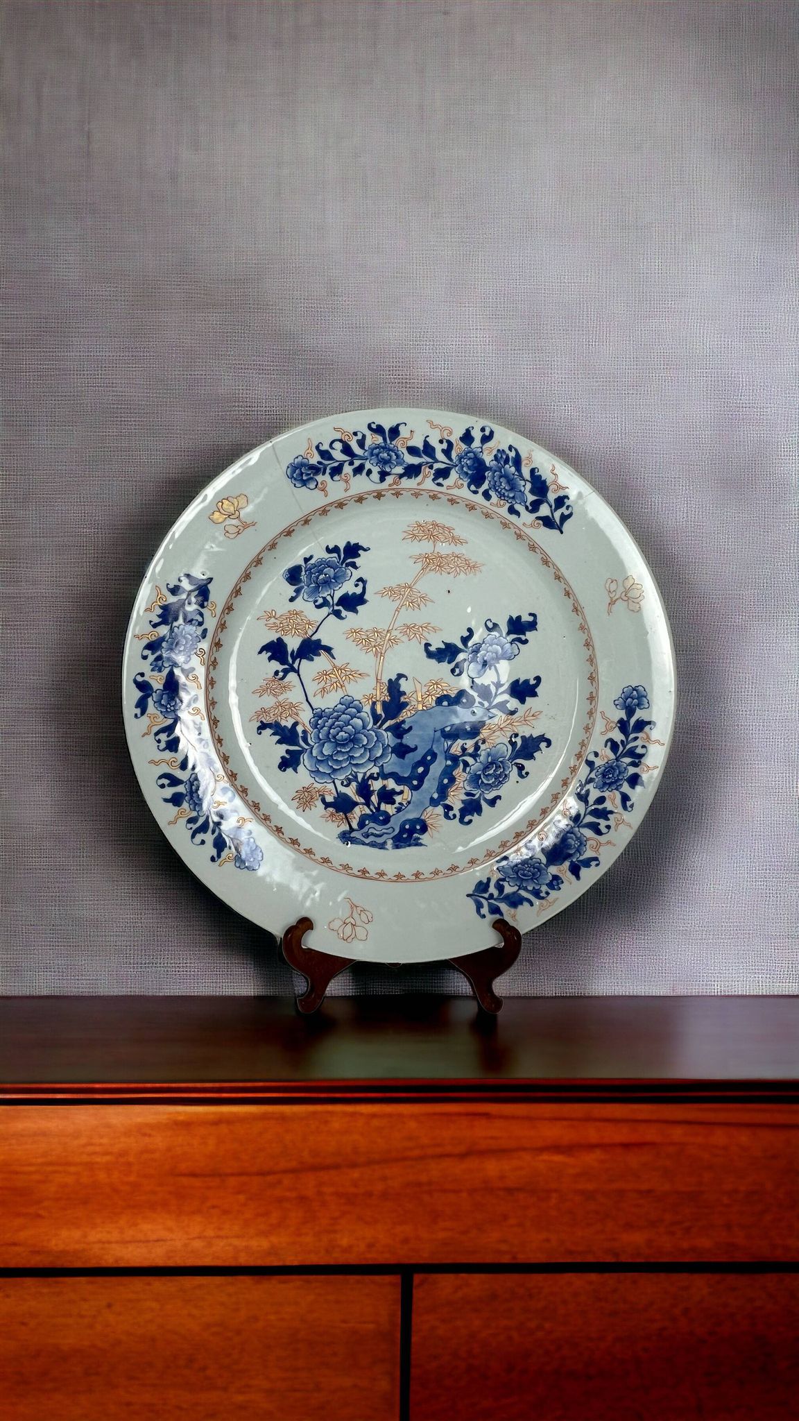 Japan, Imari porcelain plate with bamboo and peonies, 19th century.