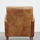 Fauteuil design en cuir de vachette couleur cognac clair