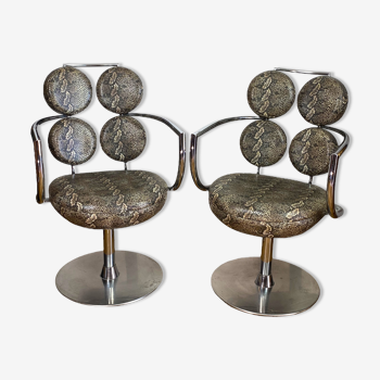 Pair of italian swivel armchairs in chrome-plated metal and piton imitation fabrics