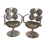 Pair of italian swivel armchairs in chrome-plated metal and piton imitation fabrics