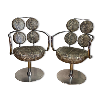 Pair of italian swivel armchairs in chrome-plated metal and piton imitation fabrics