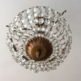 Old chandelier with bronze stamps