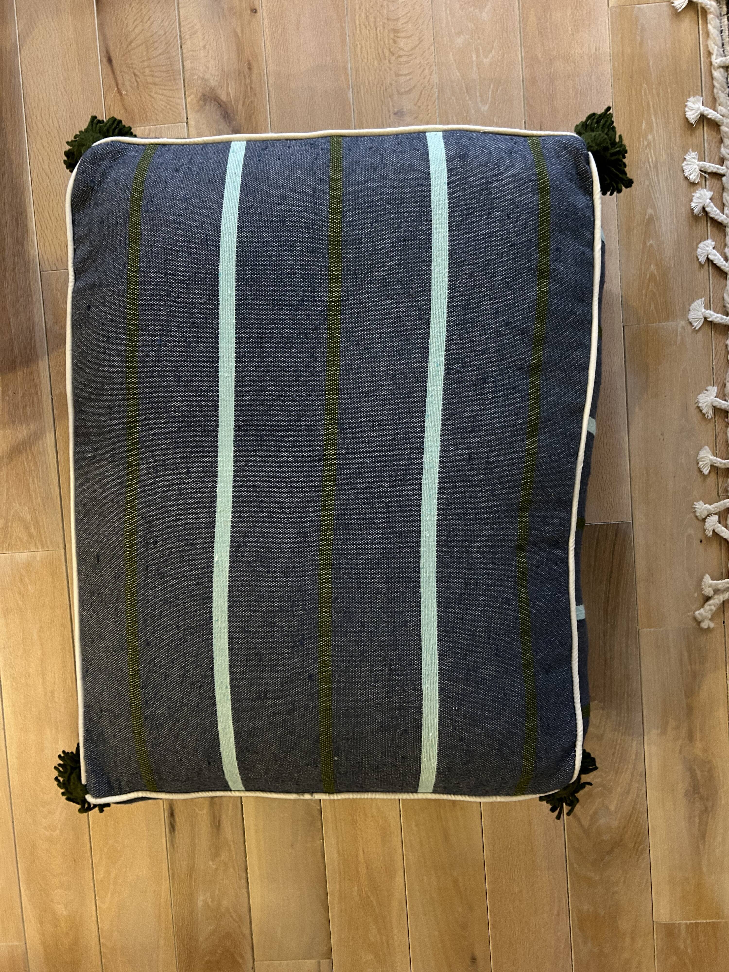 Blue striped cotton pouf