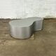 Table basse en acier inoxydable de forme organique