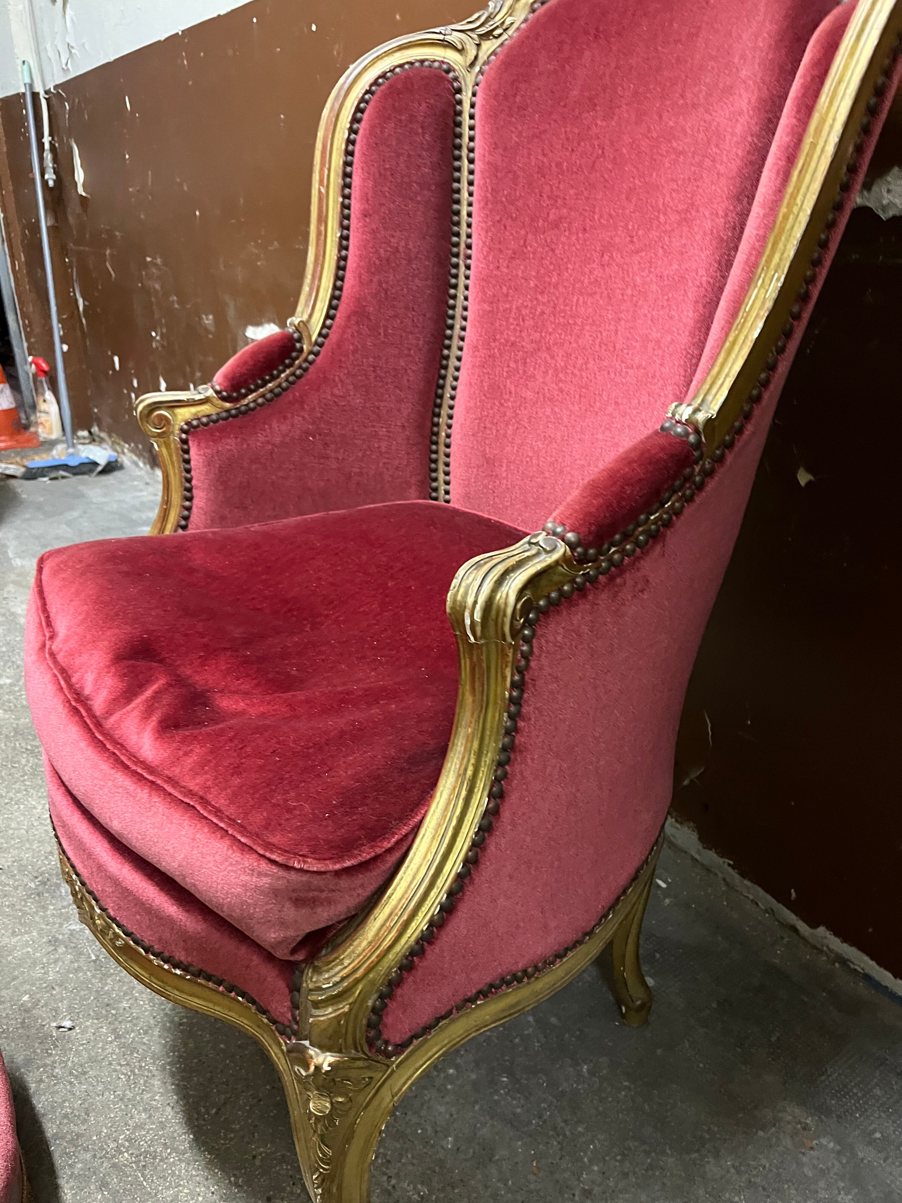 Gilded wooden armchair and footrest