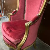 Fauteuil en bois doré et repose pieds