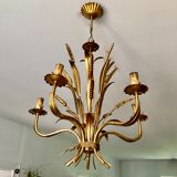 Golden suspension 5 fires with a bouquet of ears of wheat