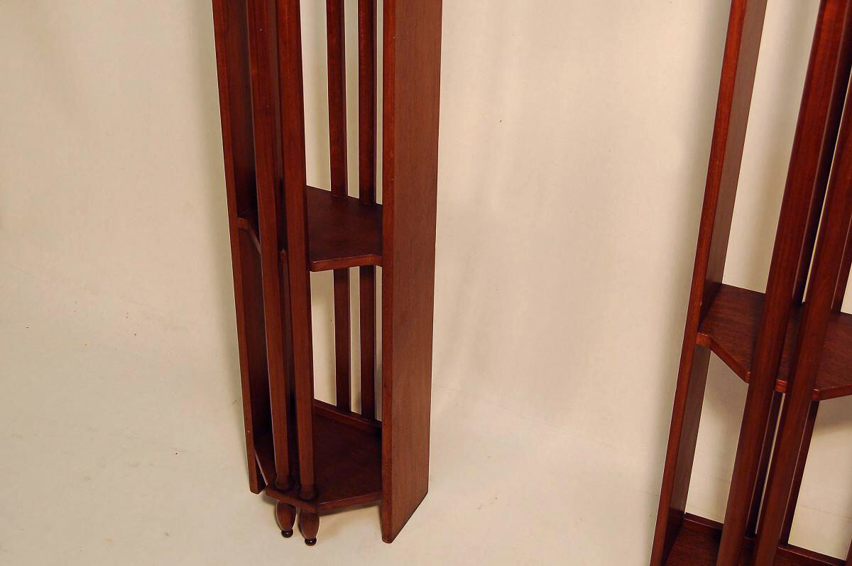 Pair of art deco mahogany wall columns