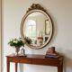 Miroir mural ovale baroque vintage à décor de noeud