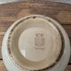 Old opaque porcelain bowl from Gien with a floral decoration.