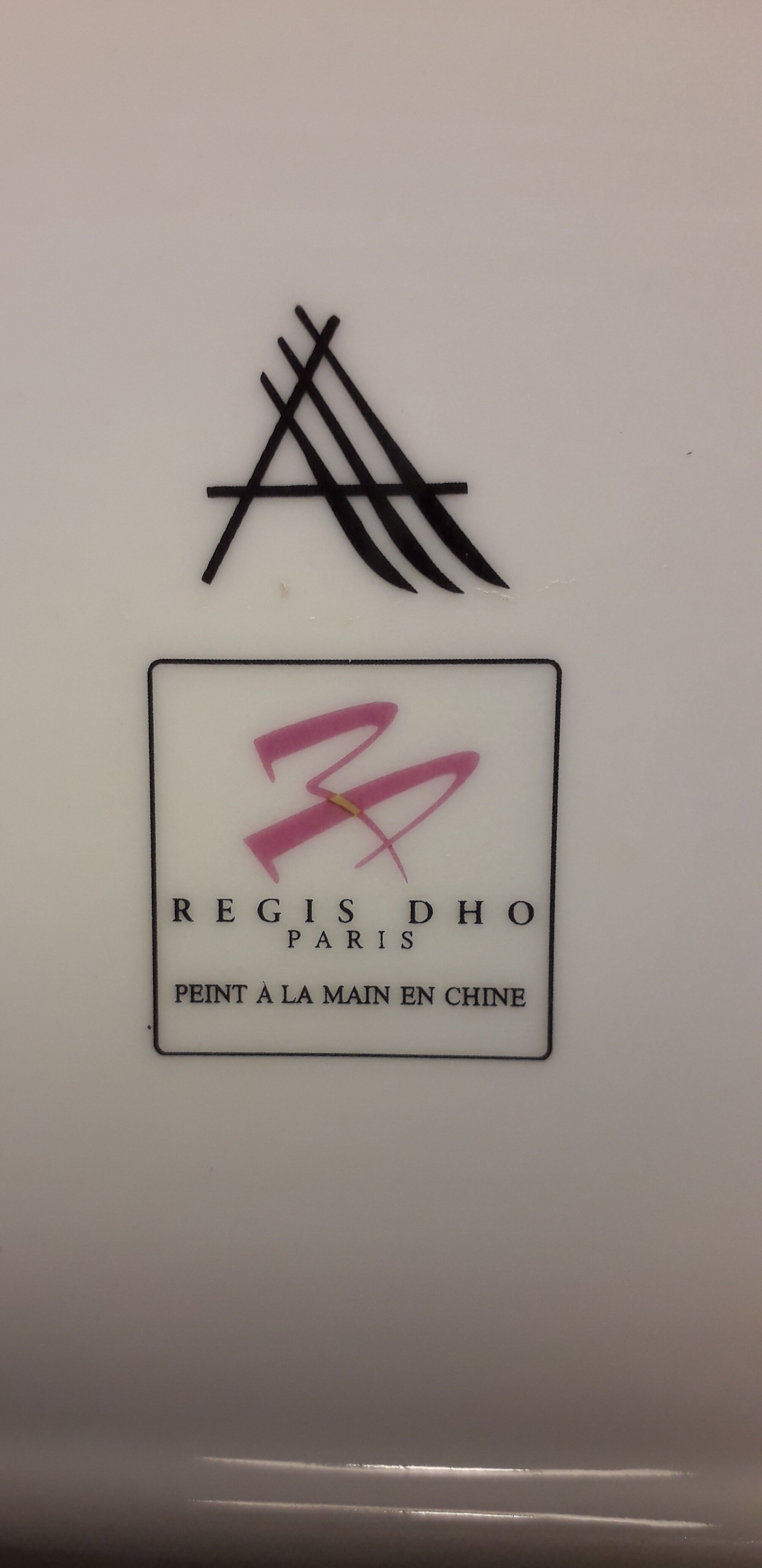 Empty cut painted porcelain pockets by designer Régis Dho