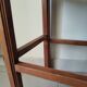 Antique campaign stool in solid wood with a straw seat.