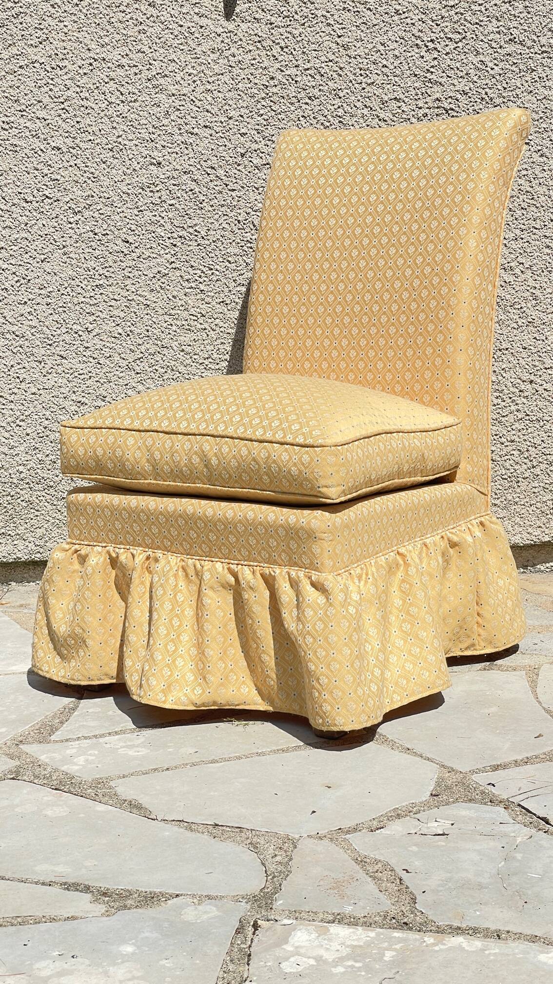 Vintage upholstered fabric toad armchair