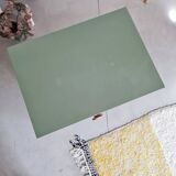 Old chest of drawers with two green drawers