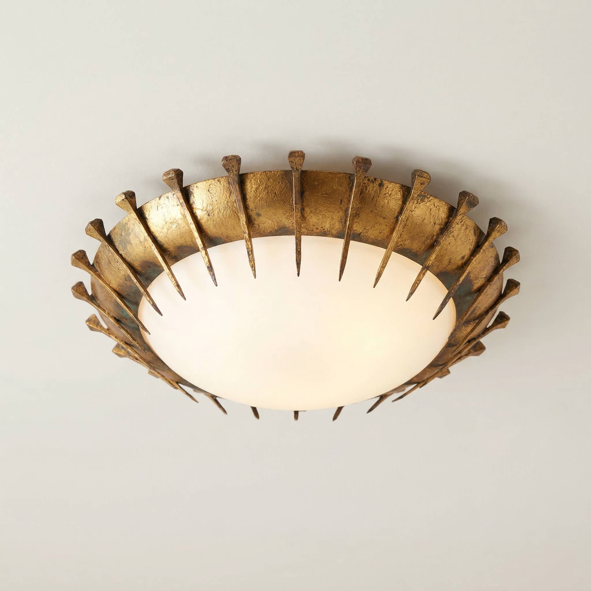 Forged nail sun lamp, gold leaf and glass, France, 1950s