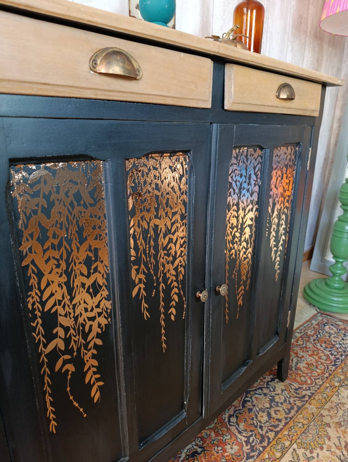 Black Parisian buffet with copper foliage