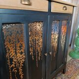 Black Parisian buffet with copper foliage