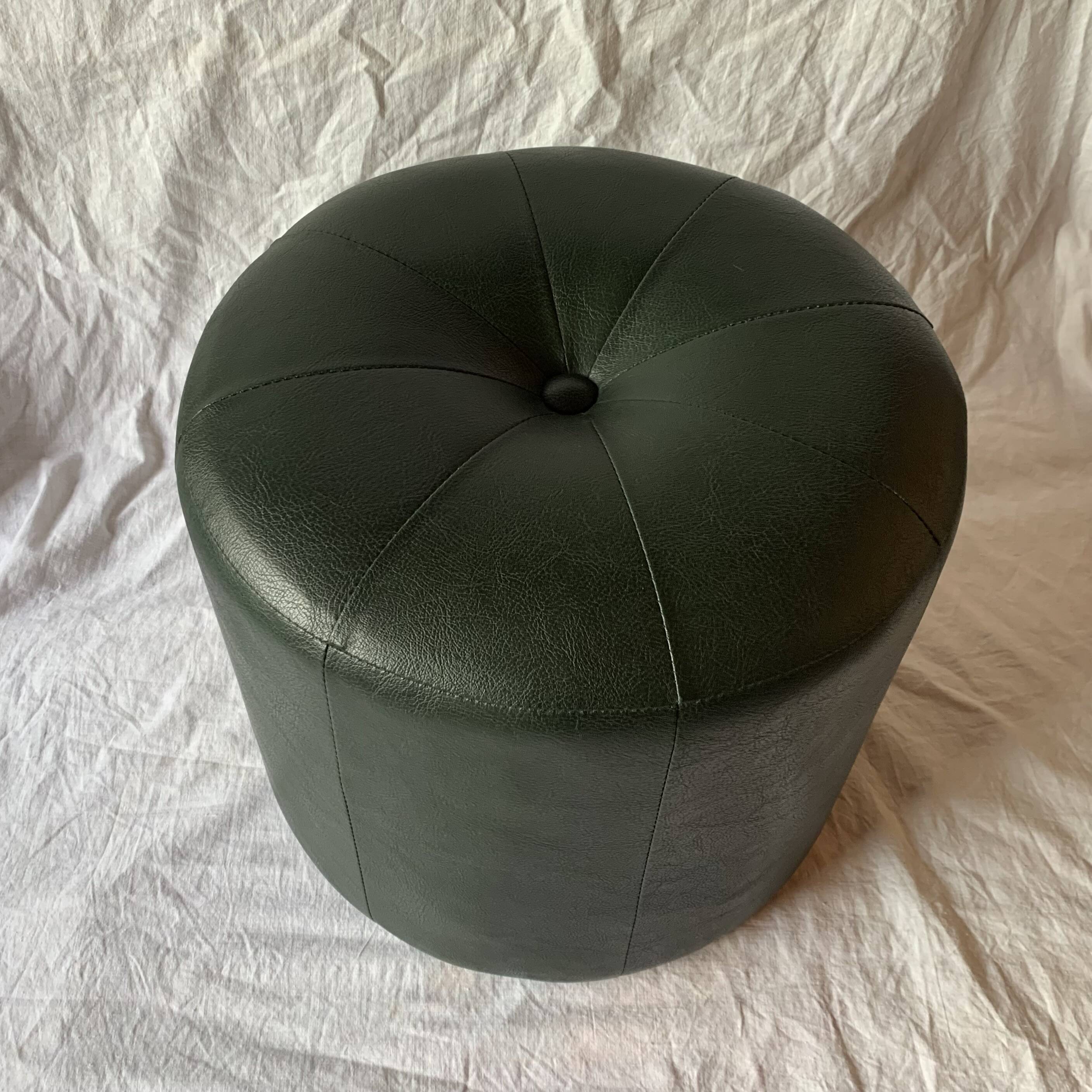 Pouf vintage rond en Skaï vert