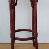 Curved wooden bar stool