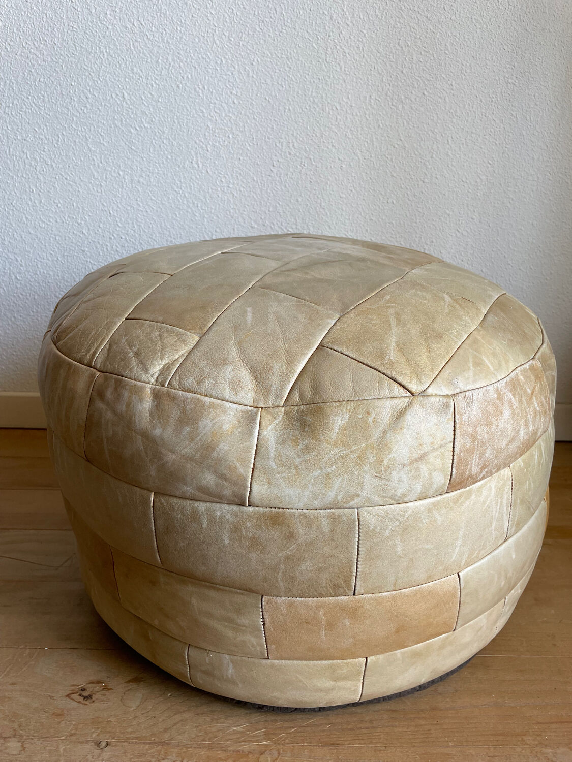Brown and beige patchwork leather pouf from sede