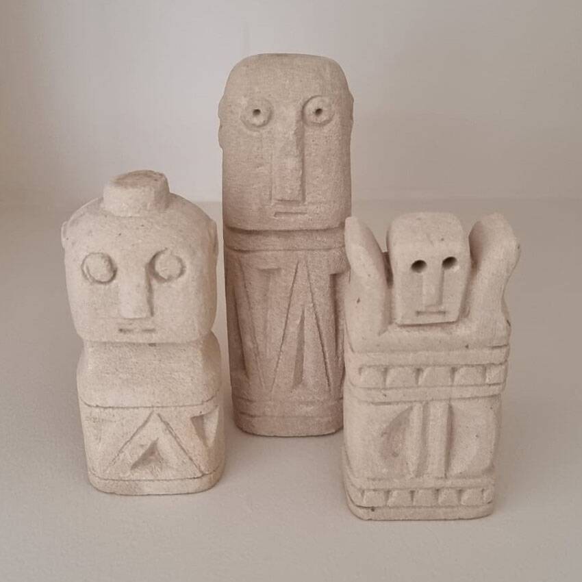 Lot of three stone statues Sumba, Indonesia