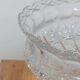 Cut crystal bowl on a brass base in bohemian style.