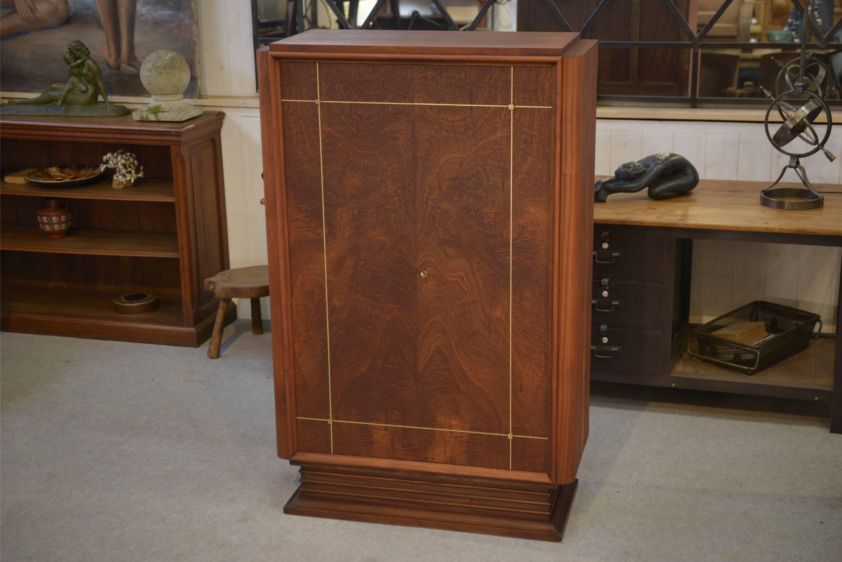 Art Deco mahogany wardrobe, signed A. Bicchierini, 1940s.