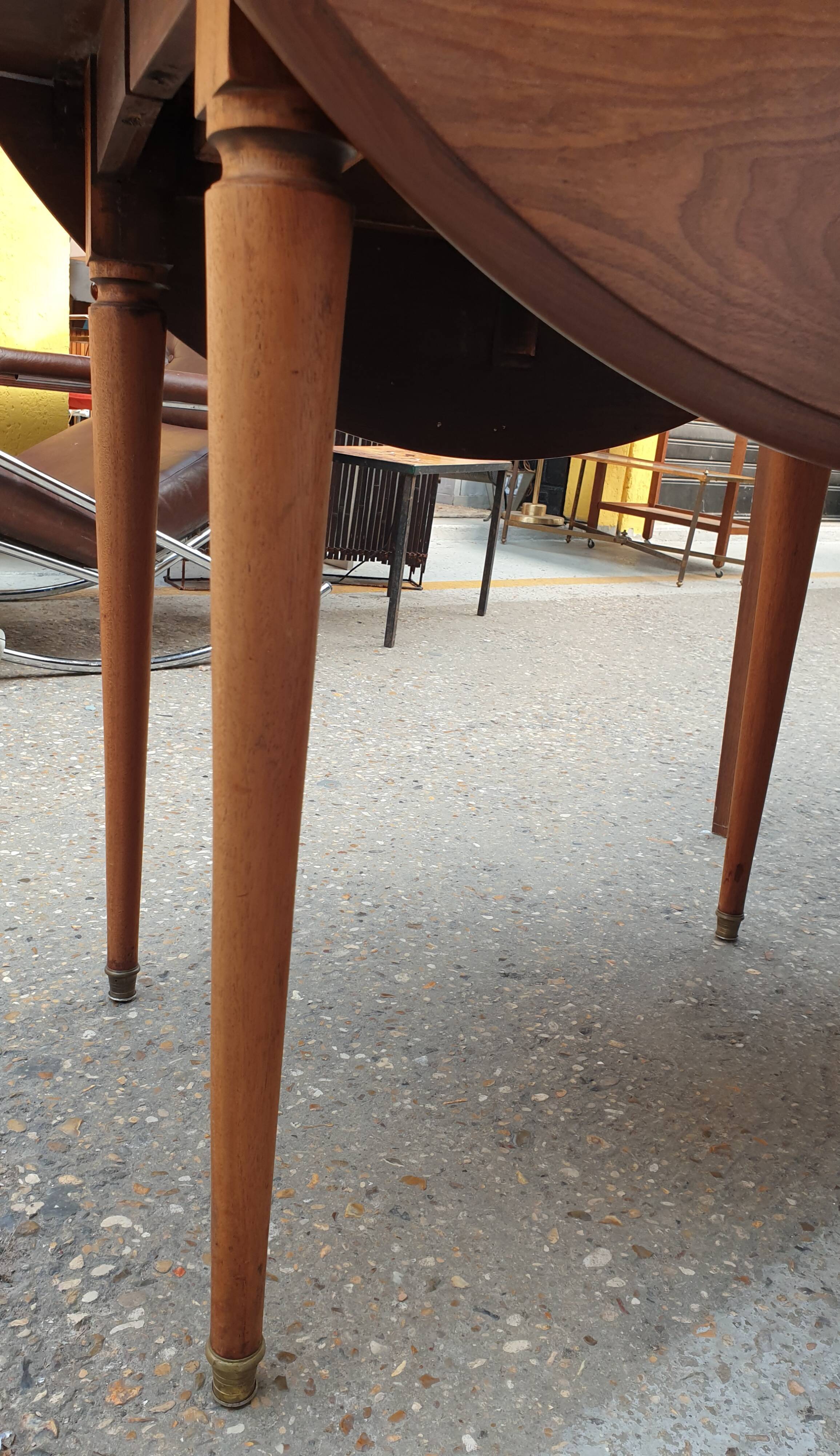 Old mahogany-shuttered round table