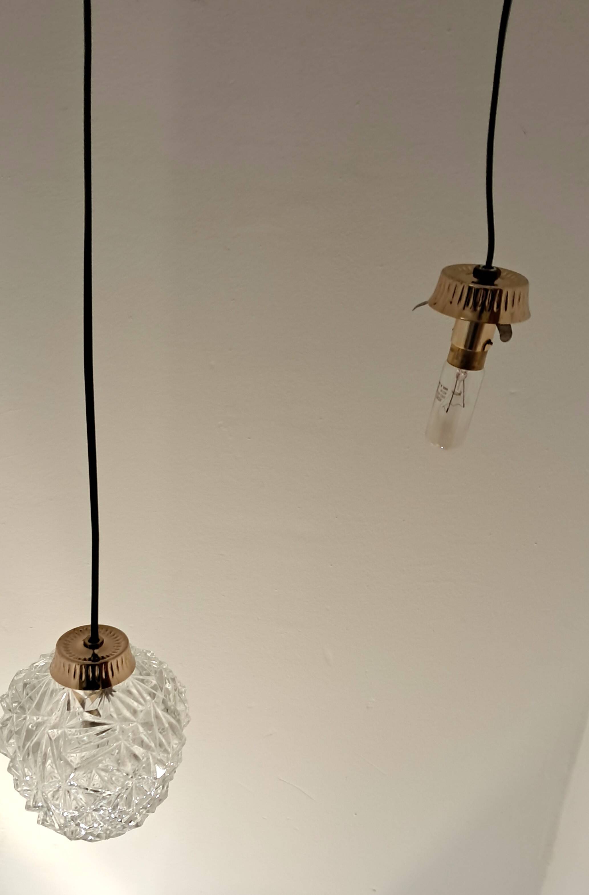 Two-light cascade pendant in gold-plated brass and molded glass