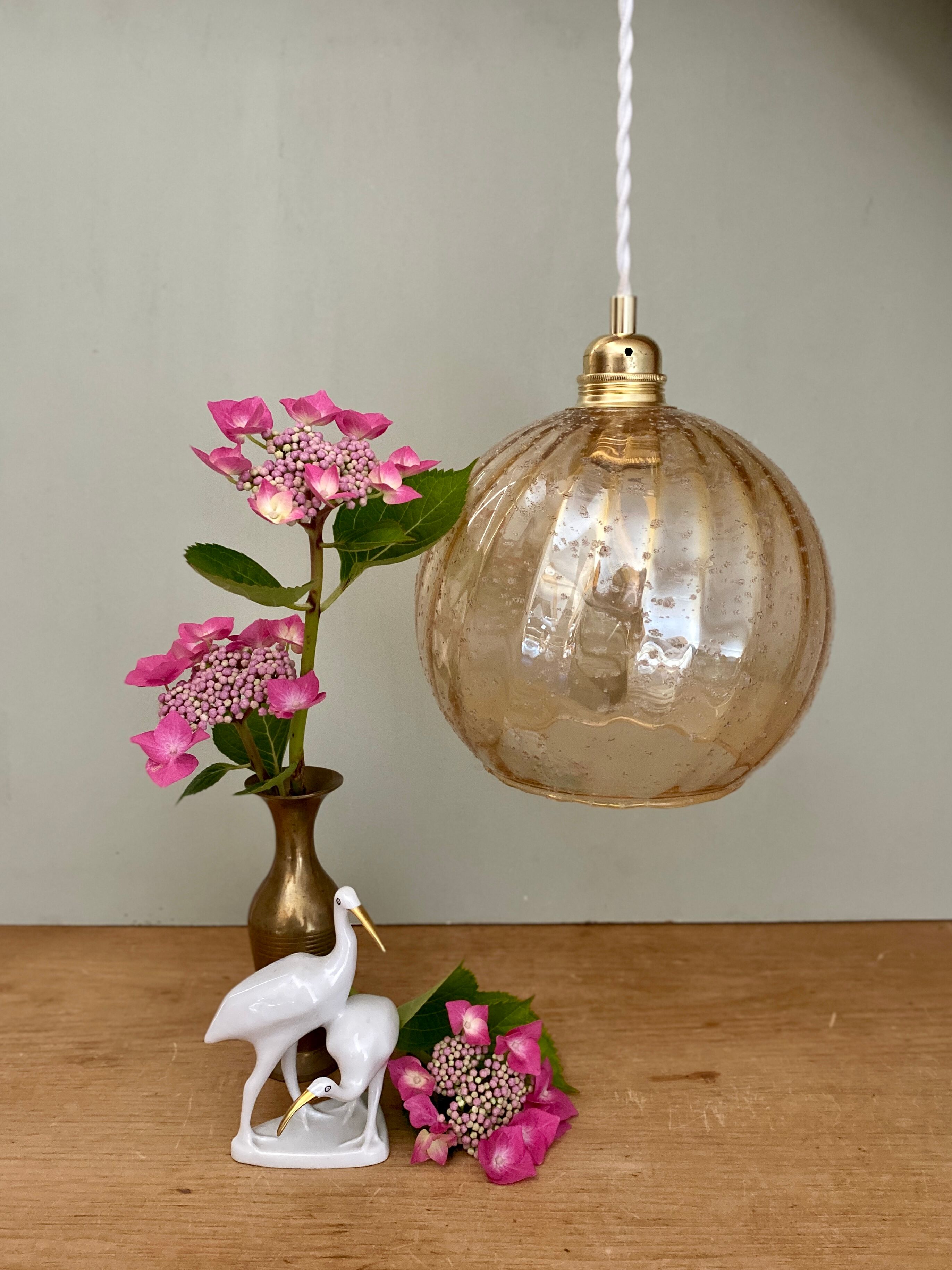 Vintage globe pendant lamp in amber glass
