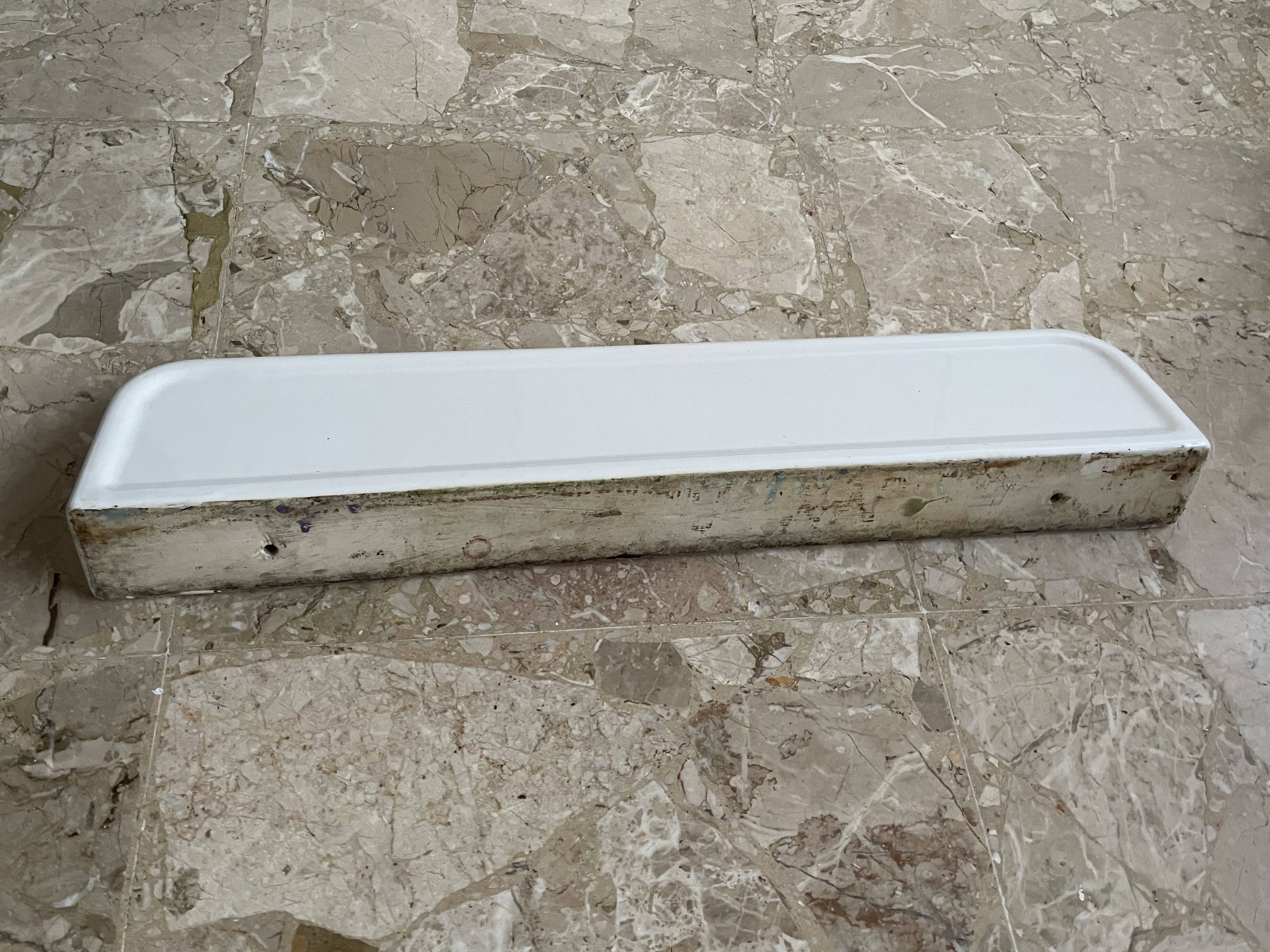 Old earthenware shelf