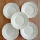 Set of 5 Sarreguemines ivory flat plates