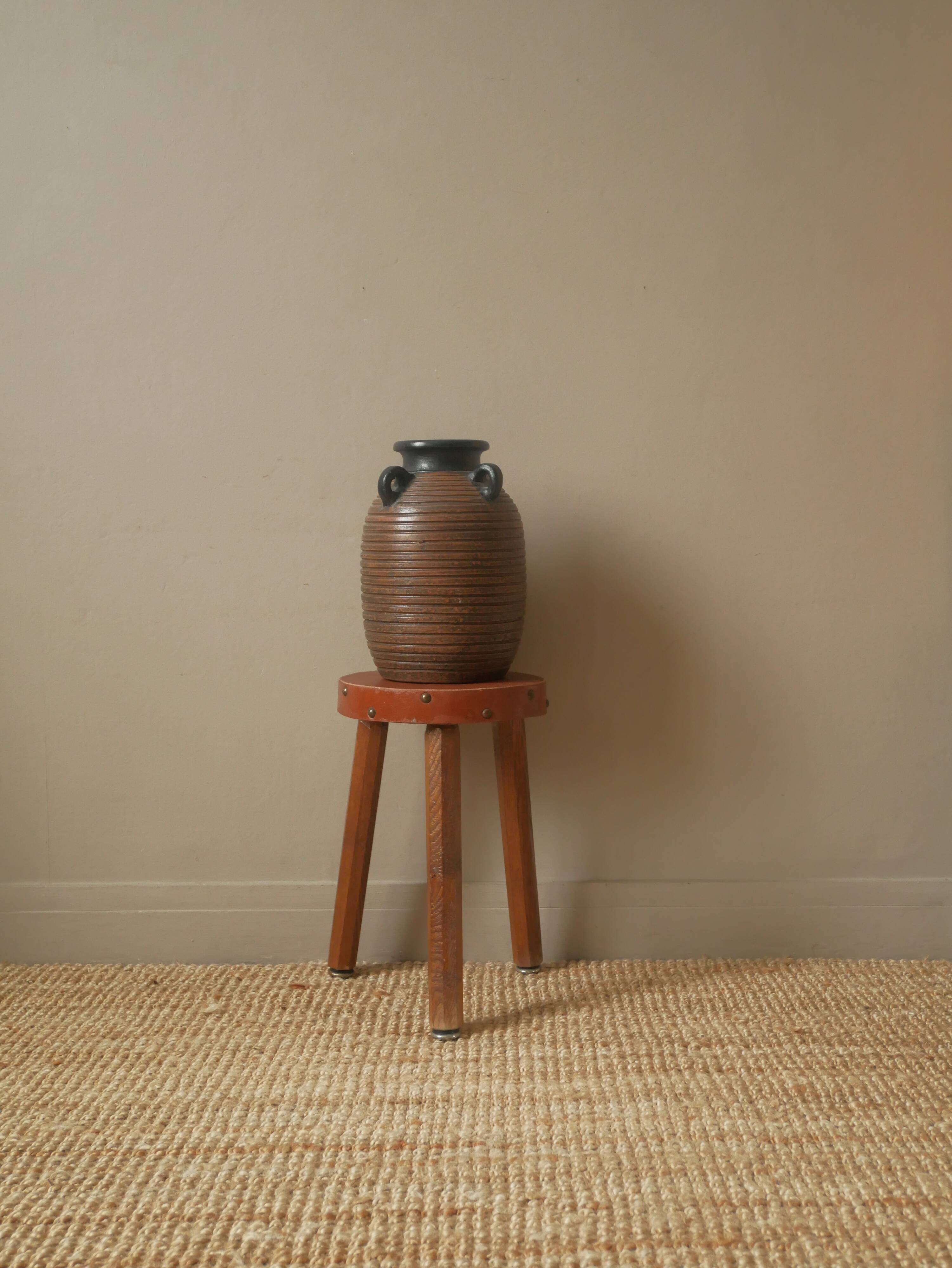 Vase with handles in vintage ceramic handmade pottery tribal ethnic decoration