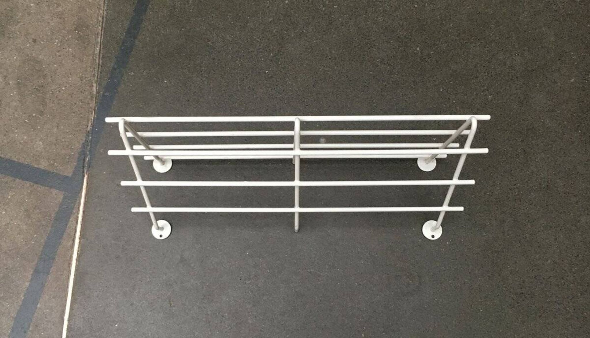 Mid-century modern minimalist metal coat rack from the 1960s.