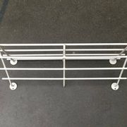 Mid-century modern minimalist metal coat rack from the 1960s.