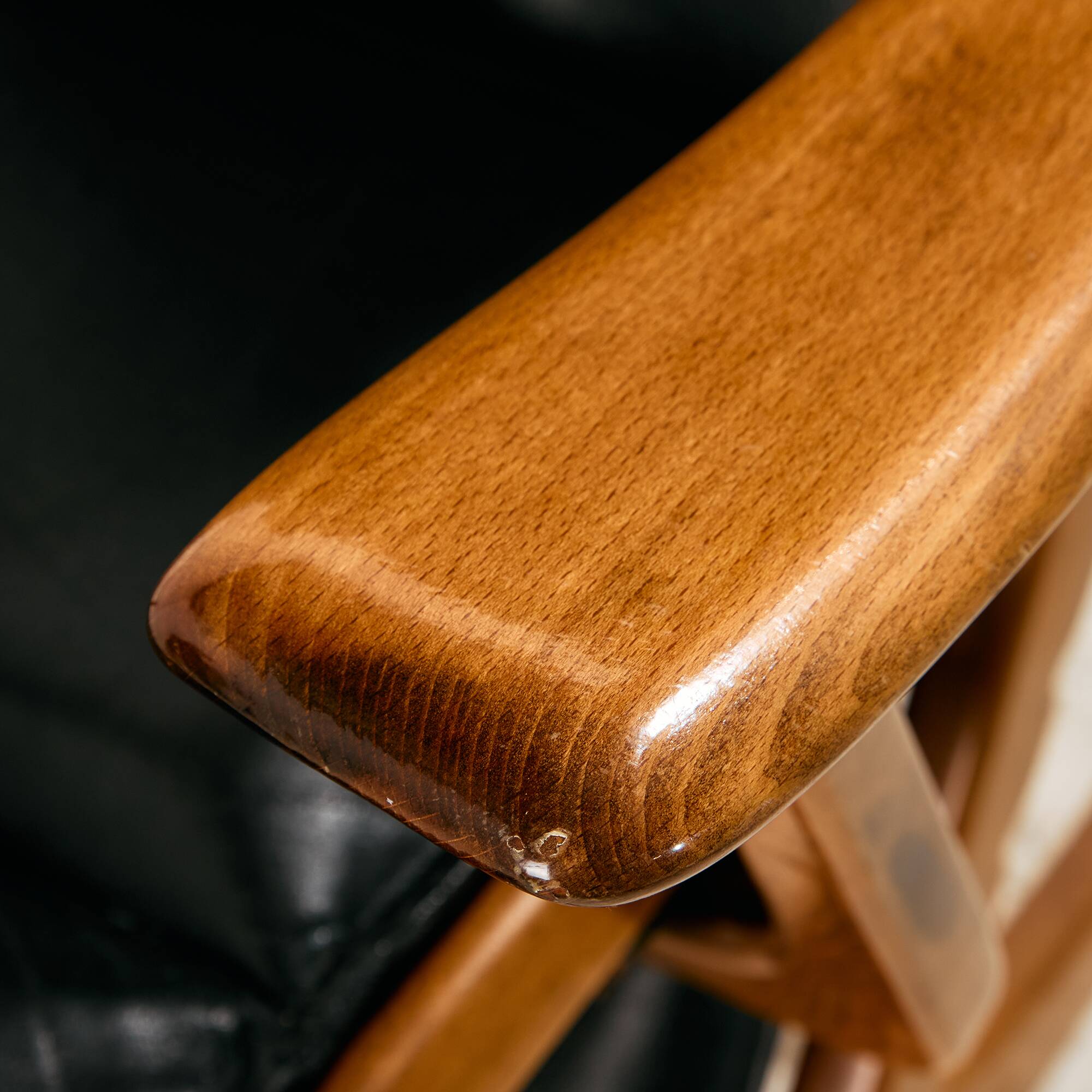 Beech armchair with leather upholstery