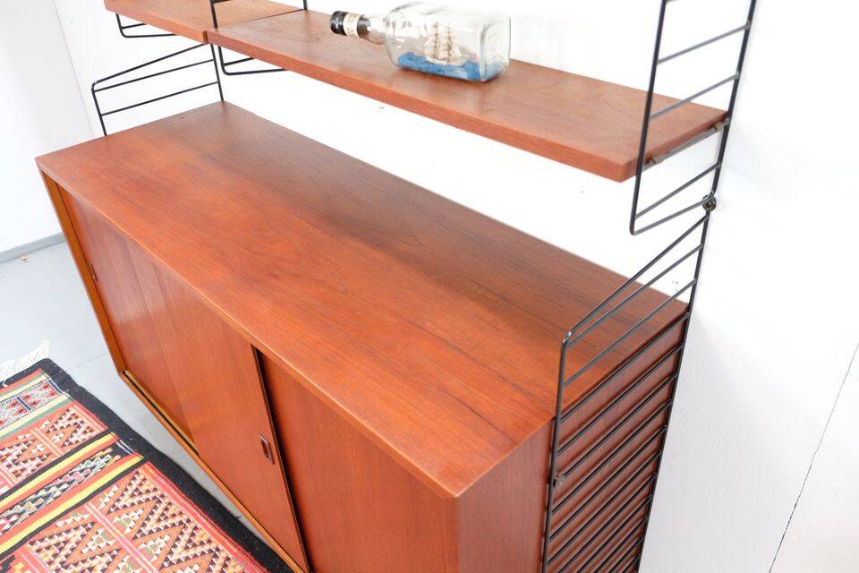 Nisse String shelf in teak, retro vintage style from the 60s-70s.