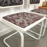 Pair of vintage tubular frame dining chairs