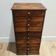 Small piece of furniture for a watchmaker or apothecary.