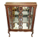 A Louis XV style display cabinet with three beechwood shelves and a white marble top.
