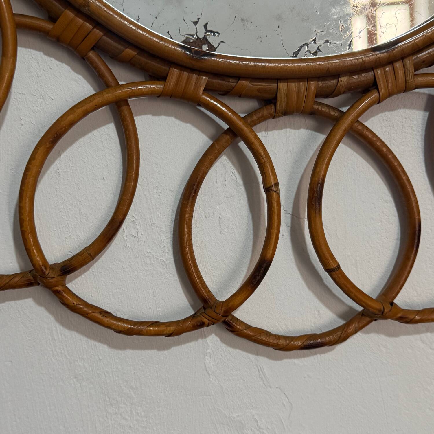 Round rattan mirror from the 1950s France