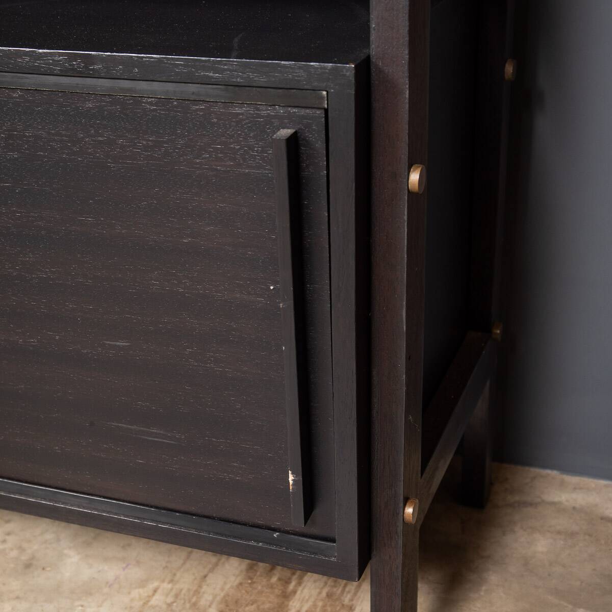 Striking 20thc italian ebonised etageres with open back & storage c.1970