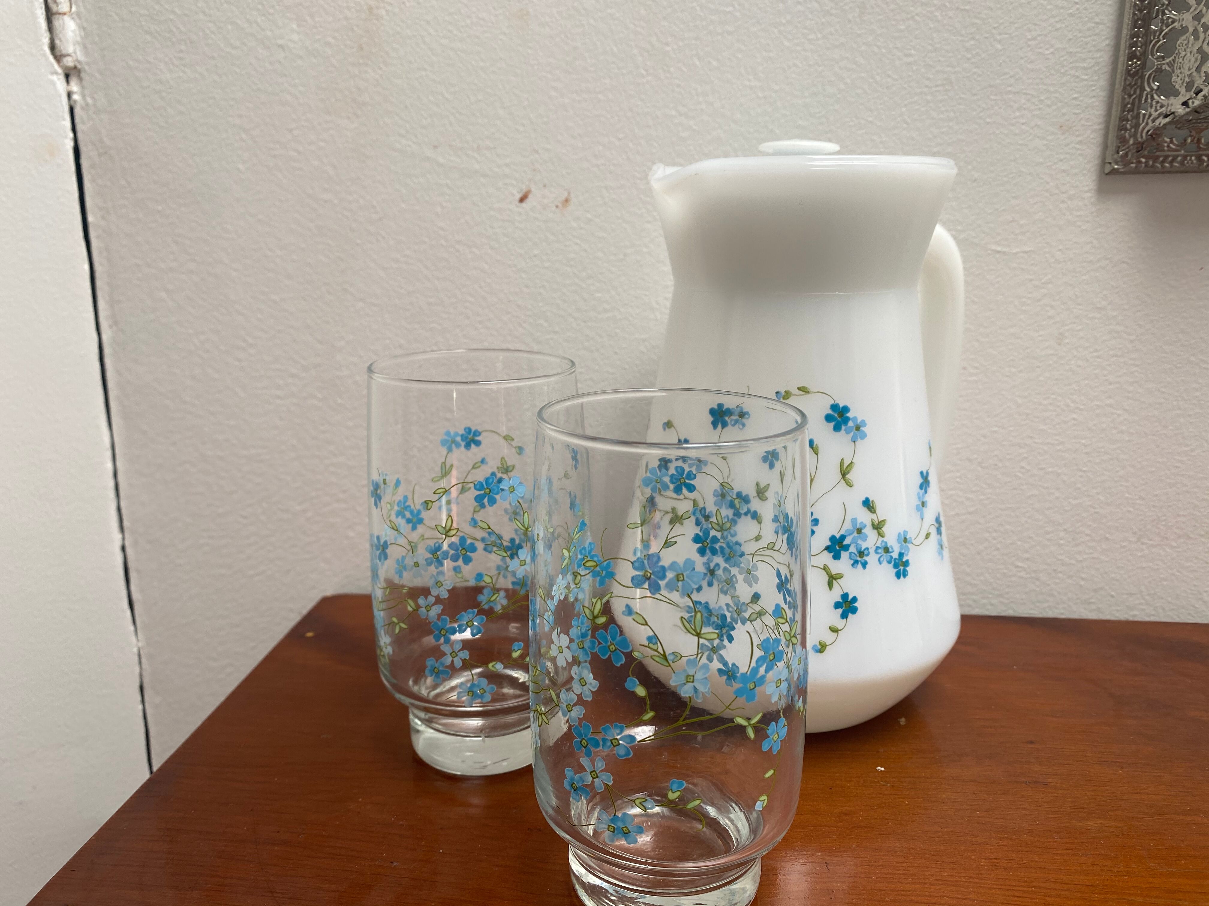Two glasses with small blue flowers