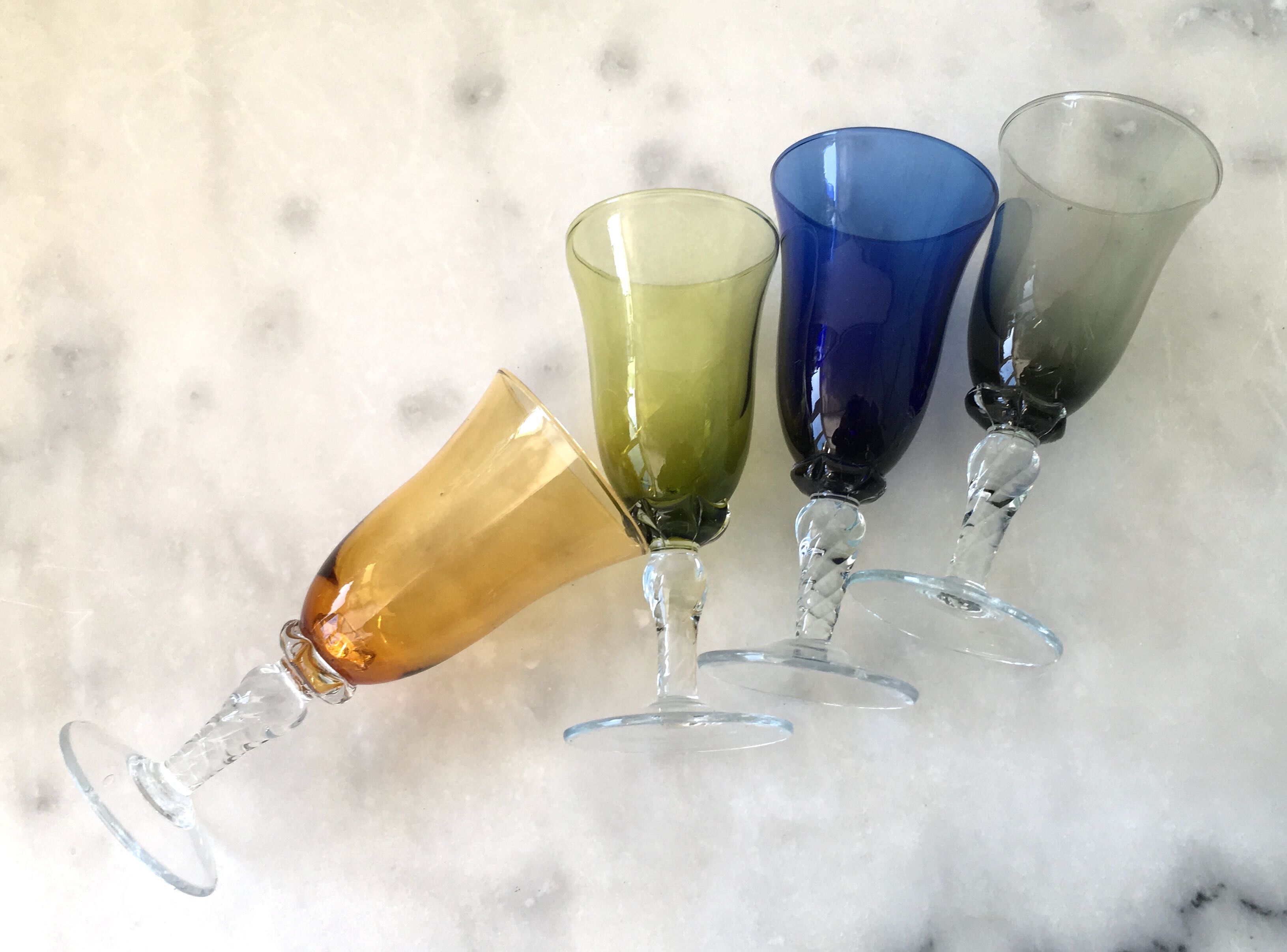 Set of four colored blown glasses