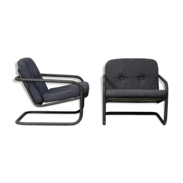 Pair of Prisunic edition armchairs, tubular steel and foam cushions, France, 1973