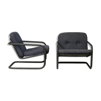 Pair of Prisunic edition armchairs, tubular steel and foam cushions, France, 1973