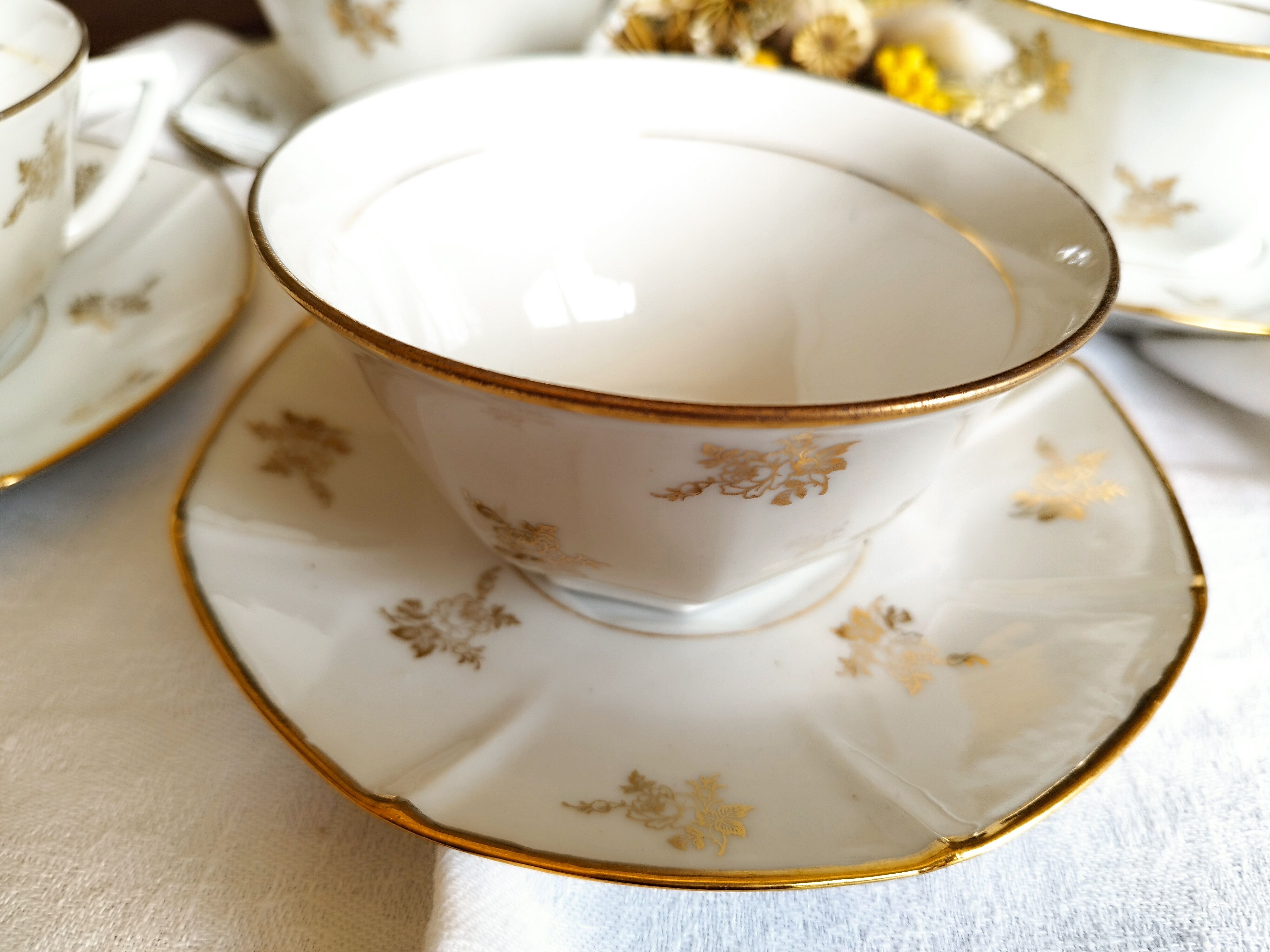 Set of 4 white porcelain cups